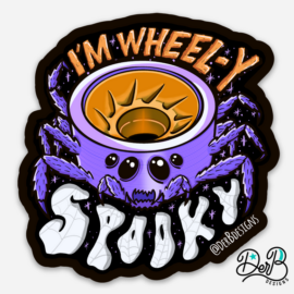 Sticker design with skate wheel spider and text: I'm Wheel-y Spooky